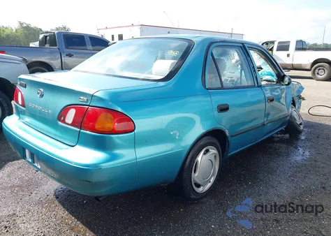 1999 Toyota Corolla Ce из США, поврежденный, VIN 2T1BR12E6XC134802